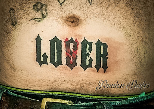 Explore scroll tattoo ideas, creative tattoo ideas in Brighton, available at Branch Out Studios - Tattoo & Piercing Lounge