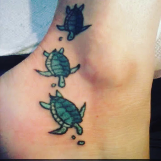 Explore hand tattoo ideas men, creative tattoo ideas in Englewood, available at The Original Big Daddy Tattoo & Body Piercing est.1997 est.1997