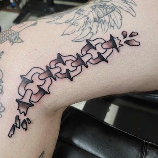 Explore cover up ideas for wrist tattoo, creative tattoo ideas in Nashville, available at RedBird Tattoo