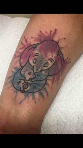 Explore pink panther tattoo ideas, creative tattoo ideas in Camarillo, available at BONE DEEP TATTOO