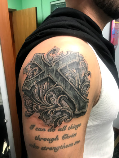 Explore small jesus tattoo ideas, creative tattoo ideas in Aurora, available at Ronin Tattoo Studio INC