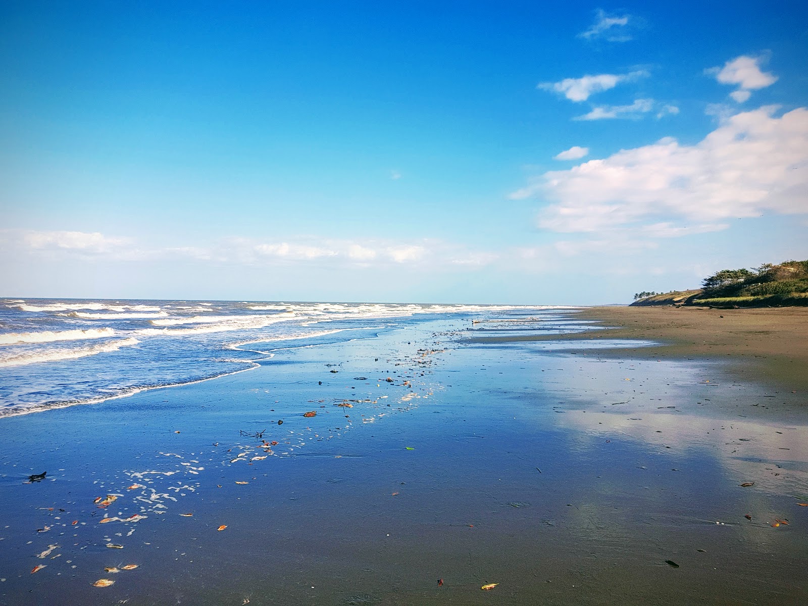Foto von Puerto Guarare Beach mit lange, gerade küste
