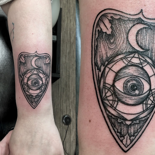 Explore dog tattoo ideas small, creative tattoo ideas in Portland, available at Obsidian Tattoo