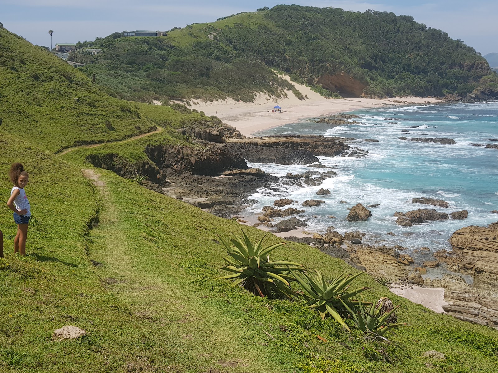 Umngazana beach II的照片 带有碧绿色纯水表面