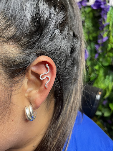Explore face tattoo ideas female, creative tattoo ideas in Pittsburg, available at Collective Arts Tattoos & Piercings