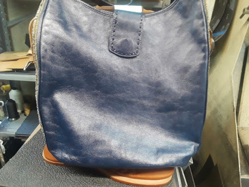 Shoe Repair Shop «Denville Shoe Repair», reviews and photos, 1 W Main St Suite 1, Denville, NJ 07834, USA