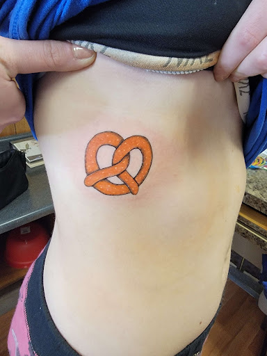 Explore cupcake tattoo ideas, creative tattoo ideas in Plymouth, available at Twisted Ink LLC