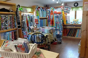 Quilted Dog Quilt Shop image