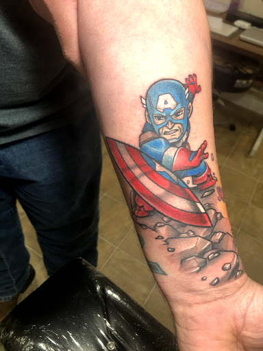 Explore fine line tattoo ideas men, creative tattoo ideas in Columbus, available at Atlas Tattoo and Piercing Studio