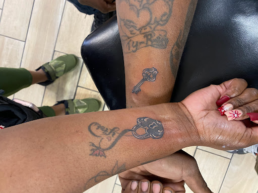 Explore wrestling tattoo ideas, creative tattoo ideas in Houston, available at Orlandos Tattoo Studio