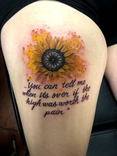 Explore upper arm tattoo ideas for females, creative tattoo ideas in San Antonio, available at Nite Owl Tattoo Studio