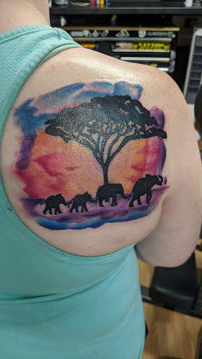 Explore tiny matching tattoo ideas, creative tattoo ideas in Council Bluffs, available at Lil Bros Tattoo