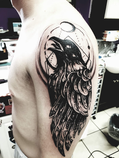 Explore tattoo book ideas, creative tattoo ideas in Bowling Green, available at The Mad Tatter, L.L.C.