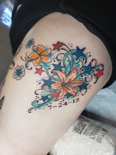 Explore november birth flower tattoo ideas, creative tattoo ideas in Dunn, available at Heart and Hammer Tattoo Co.