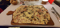 Tarte flambée du Restaurant de spécialités alsaciennes Restaurant A l'Escale du Ried à Muttersholtz - n°11