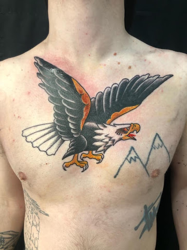 Explore small thigh tattoo ideas, creative tattoo ideas in Houghton Lake, available at Screaming Eagle Tattoo