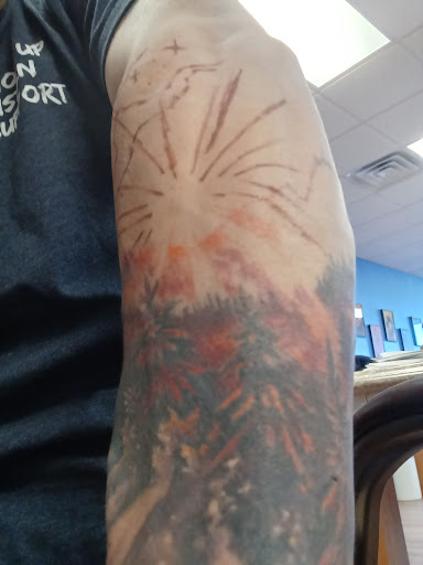 Explore tribal head tattoo ideas, creative tattoo ideas in Rochester, available at Seth Snell Tattoo Studio