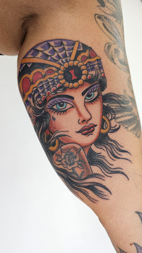 Find bracelet tattoo ideas for your next unique tattoo in Kearney at Bread N Butter Tattoo