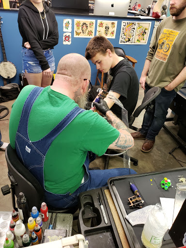 Explore rock climbing tattoo ideas, creative tattoo ideas in Noblesville, available at Mystic Images Tattoo Co.