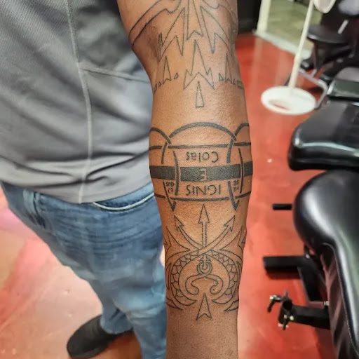 Explore fist tattoo ideas, creative tattoo ideas in Inverness, available at The Perfect Spot Tattoos