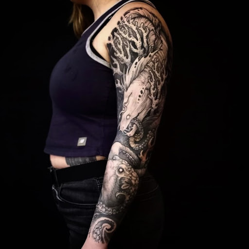 Explore fist bump tattoo ideas, creative tattoo ideas in Tulsa, available at Eleventh & Rockford Tattoo