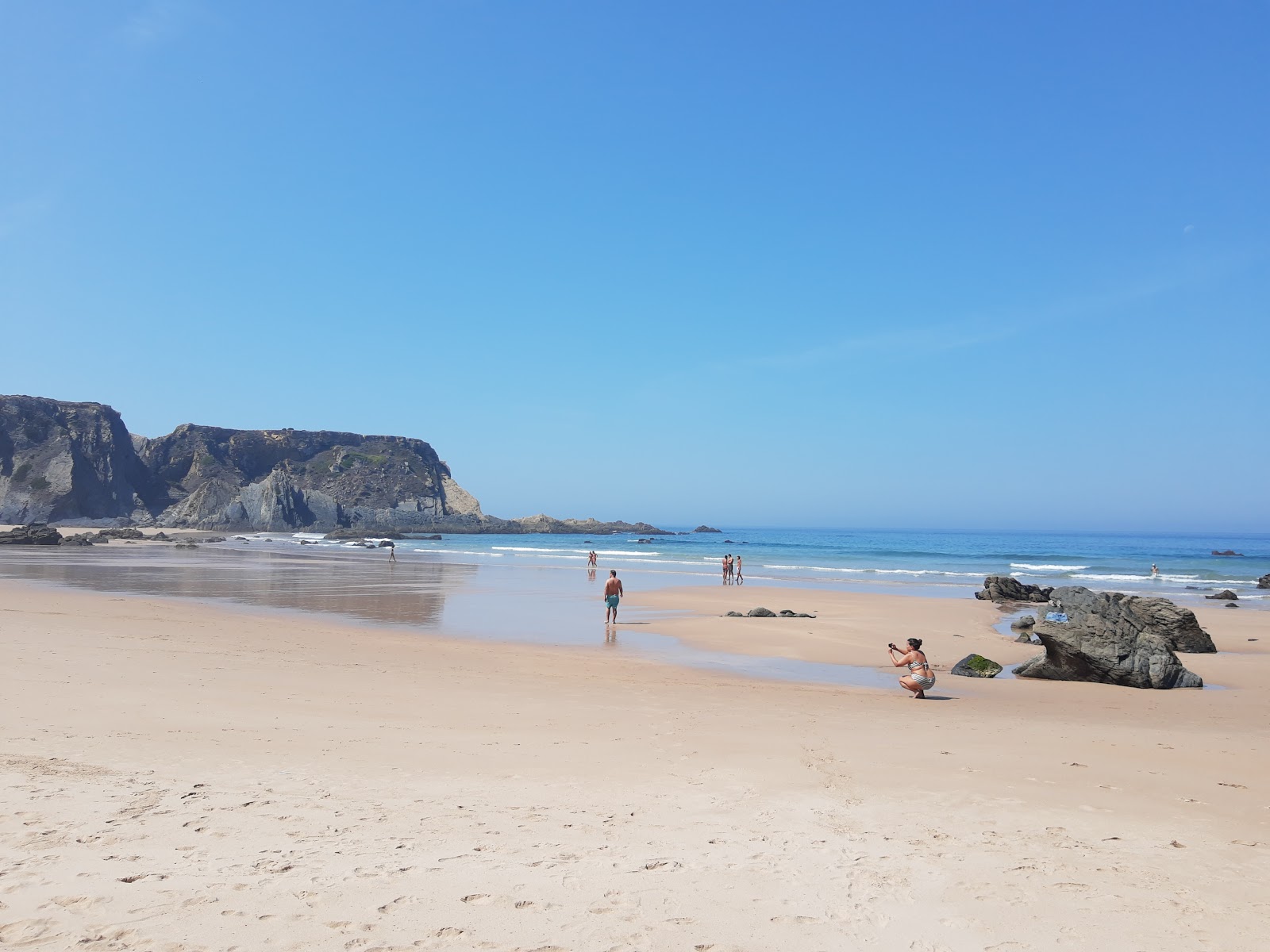 Photo of Praia dos Machados with turquoise pure water surface