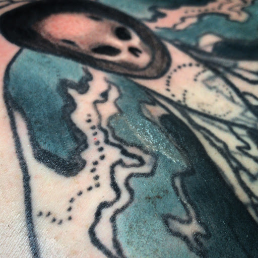 Explore cover up tattoo ideas male chest, creative tattoo ideas in Tecumseh, available at Lucid Tattoo Gallery