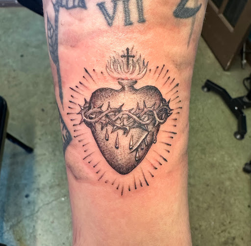 Explore father tattoo ideas, creative tattoo ideas in Dallas, available at Cedar Springs Tattoo & Piercing