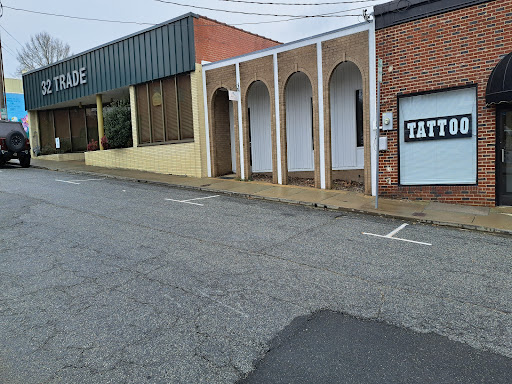 Explore matching husband and wife tattoo ideas, creative tattoo ideas in Thomasville, available at Trade Street Tattoos