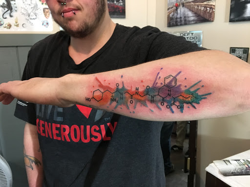 Explore growth tattoo ideas, creative tattoo ideas in Kingsford, available at Deft Tattoo Studio
