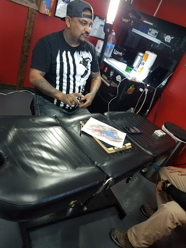 Explore arm cross tattoo ideas, creative tattoo ideas in Hardeeville, available at INK REVOLUZION TATTOOS LLC