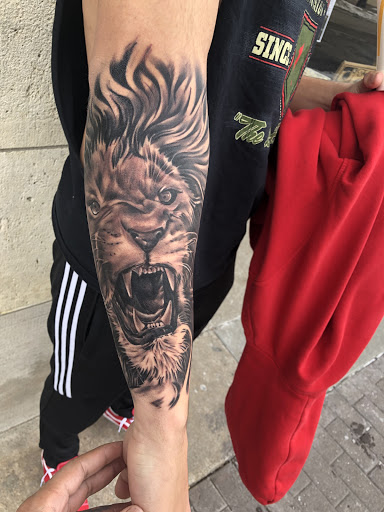 Explore animal skull tattoo ideas, creative tattoo ideas in Junction City, available at New Era Tattoo Studio