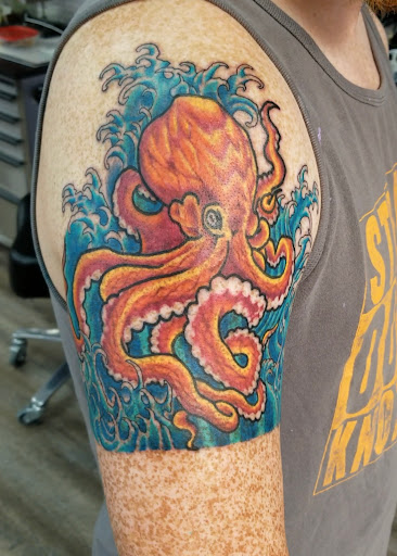 Explore tattoo ideas for forearm, creative tattoo ideas in Knoxville, available at Archangel Custom Ink Tattoo & Piercing