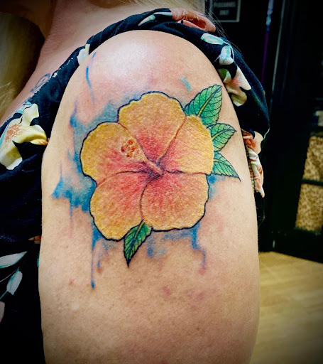 Explore neck tattoo men ideas, creative tattoo ideas in Fort Myers Beach, available at Paradise Tattoo