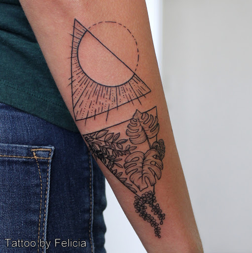 Explore 2006 tattoo ideas, creative tattoo ideas in Fort Myers, available at Tiger Lotus Tattoo and Piercing