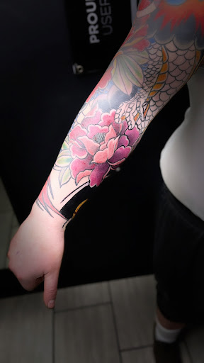 Explore bluebonnet tattoo ideas, creative tattoo ideas in Cadillac, available at Limitless Ink Tattoo Studio