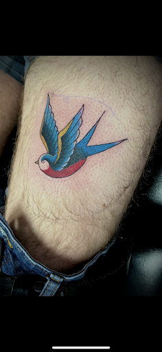 Explore apple tattoo ideas, creative tattoo ideas in Demotte, available at Revelations Tattoo Parlor