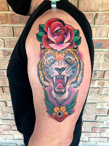 Find symbol ideas for tattoos for your next unique tattoo in Tallmadge at Killjoy tattoo