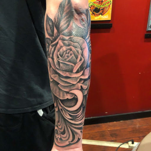 Explore snowboarding tattoo ideas, creative tattoo ideas in Houston, available at Sintown Tattoo Studio