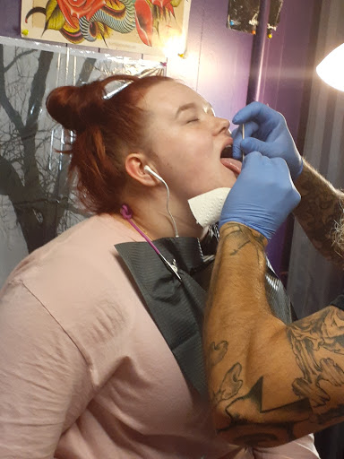 Explore mask tattoo ideas, creative tattoo ideas in Denison, available at Mad House Tattoos