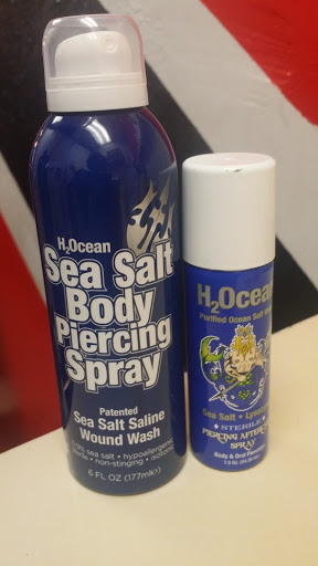 Explore ankle chain tattoo ideas, creative tattoo ideas in Cincinnati, available at Twisted Nails, Piercings & Tattoos