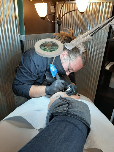 Explore mirror tattoo ideas, creative tattoo ideas in Hayward, available at Three Tentacles Tattoo Studio