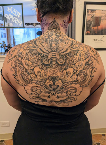Find female japanese tattoo ideas for your next unique tattoo in Hebron at Explosive Ink Tattoo