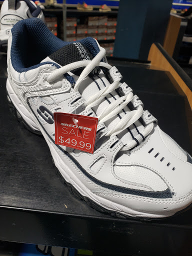 Stores to buy women's white sneakers Houston