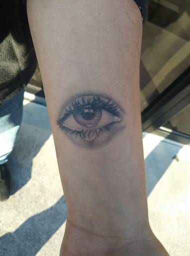 Explore medium tattoo ideas for females, creative tattoo ideas in Calhoun, available at Velvet Panther Tattoo and Piercing