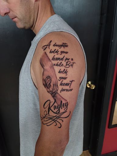 Explore thigh tattoo ideas for females, creative tattoo ideas in Shelbyville, available at Ink & Skin Studios Inc