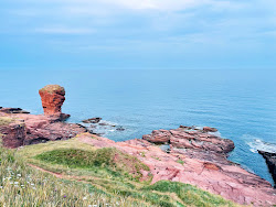 Foto av Seaton Cliffs Beach med hög nivå av renlighet