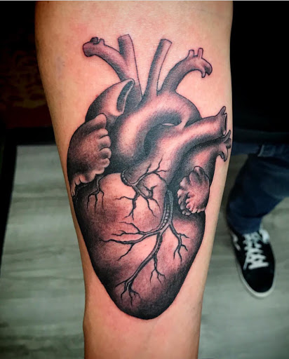 Explore snail tattoo ideas, creative tattoo ideas in Dallas, available at Change of Tides Tattoo