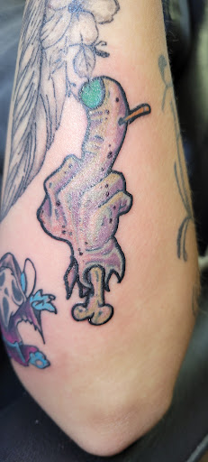 Explore bmo tattoo ideas, creative tattoo ideas in Angola, available at Hoodlum Ink