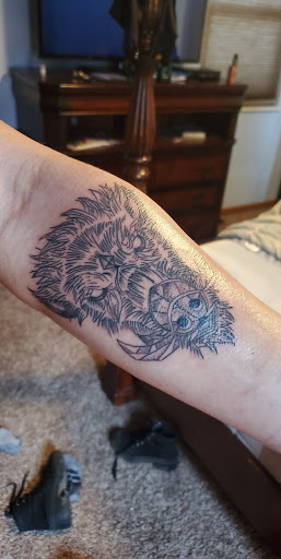 Find tattoos under the breast ideas for your next unique tattoo in Moab at Moab Tattoo